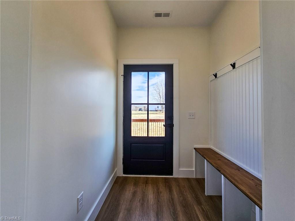 231 Viewmont Lane Ronda, NC 28670 - Photo 26 of 31 Backdoor access w/ entryway storage bench!