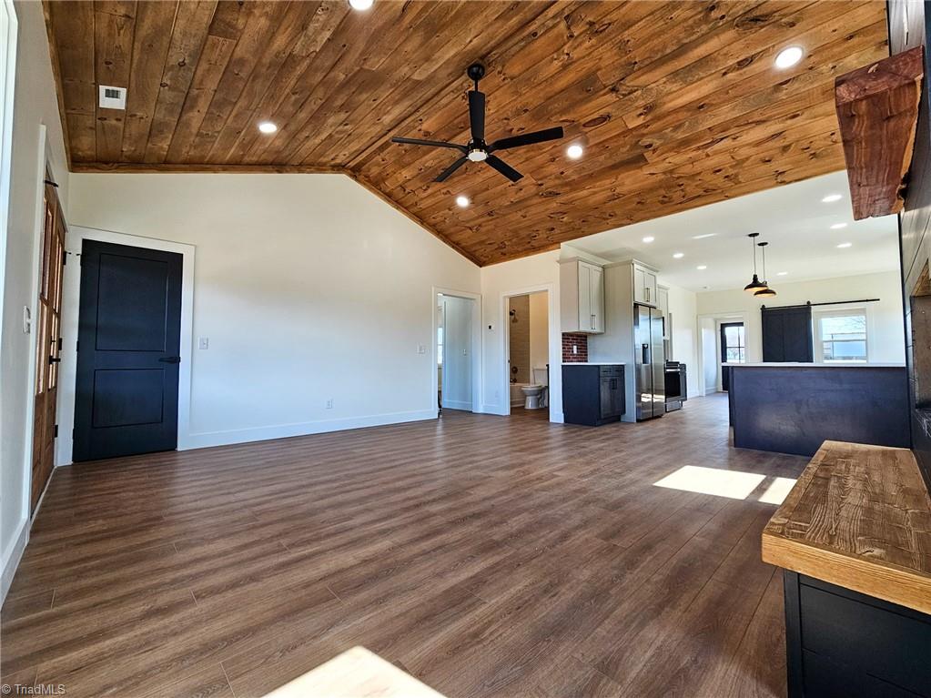 231 Viewmont Lane Ronda, NC 28670 - Photo 6 of 31 Living room w/ tongue & groove vaulted ceilings