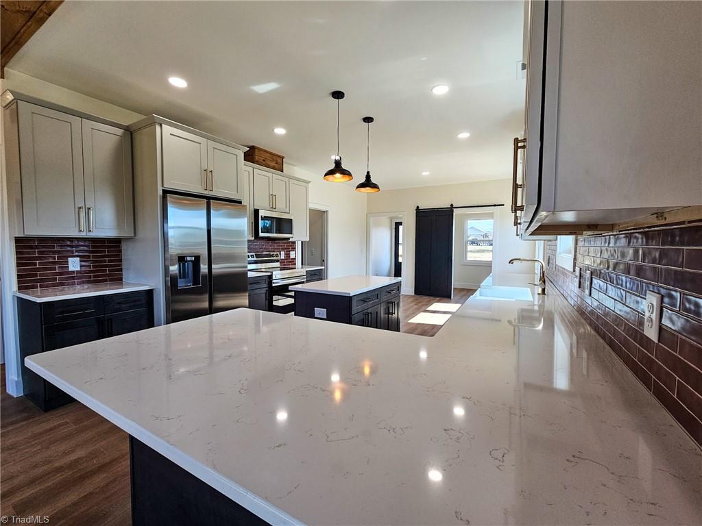 231 Viewmont Lane Ronda, NC 28670 - Photo 7 of 31 Carrara Gold Quartz Countertops!