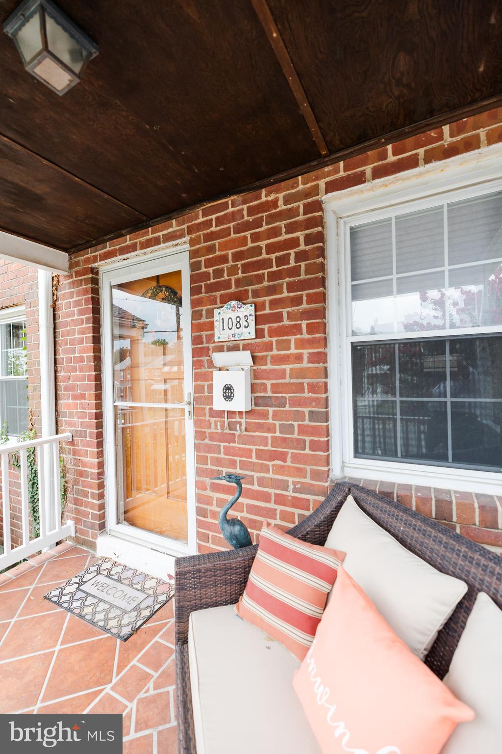 1083 Elm Road Baltimore, MD 21227 - Photo 2 of 33 a outdoor space with a couch