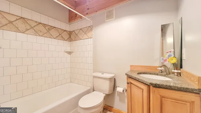 a view of a hallway with closet