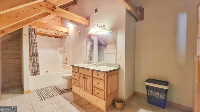 a view of a hallway view with wooden floor and staircase
