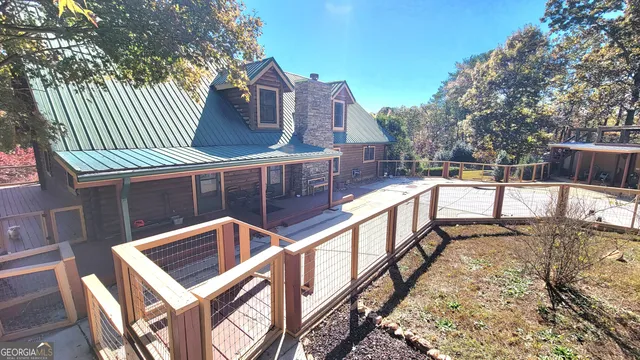 a view of balcony with two chairs