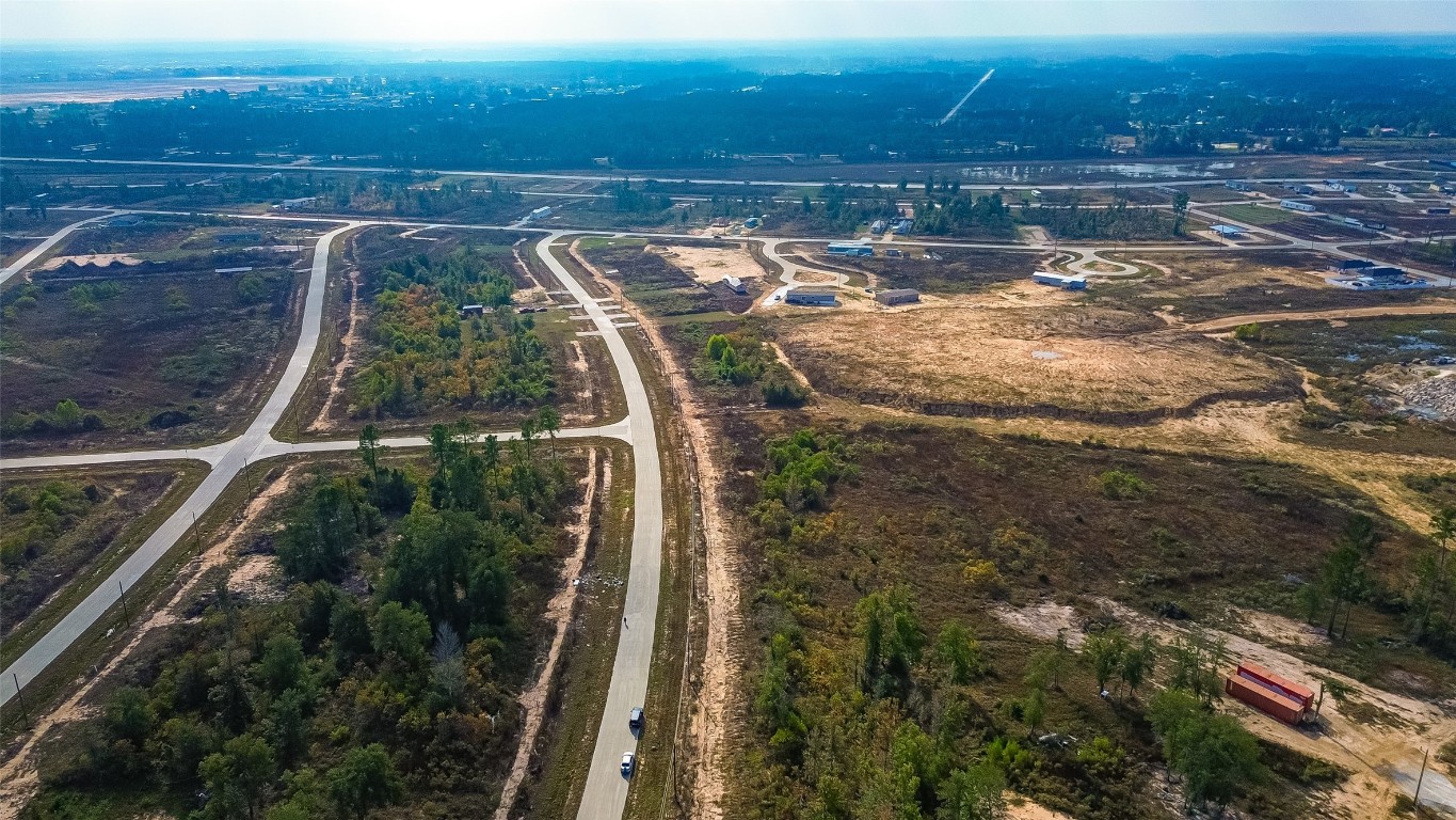 633 5914 07 Cleveland, TX 77327 - Photo 6 of 13 a view of a lake with a mountain