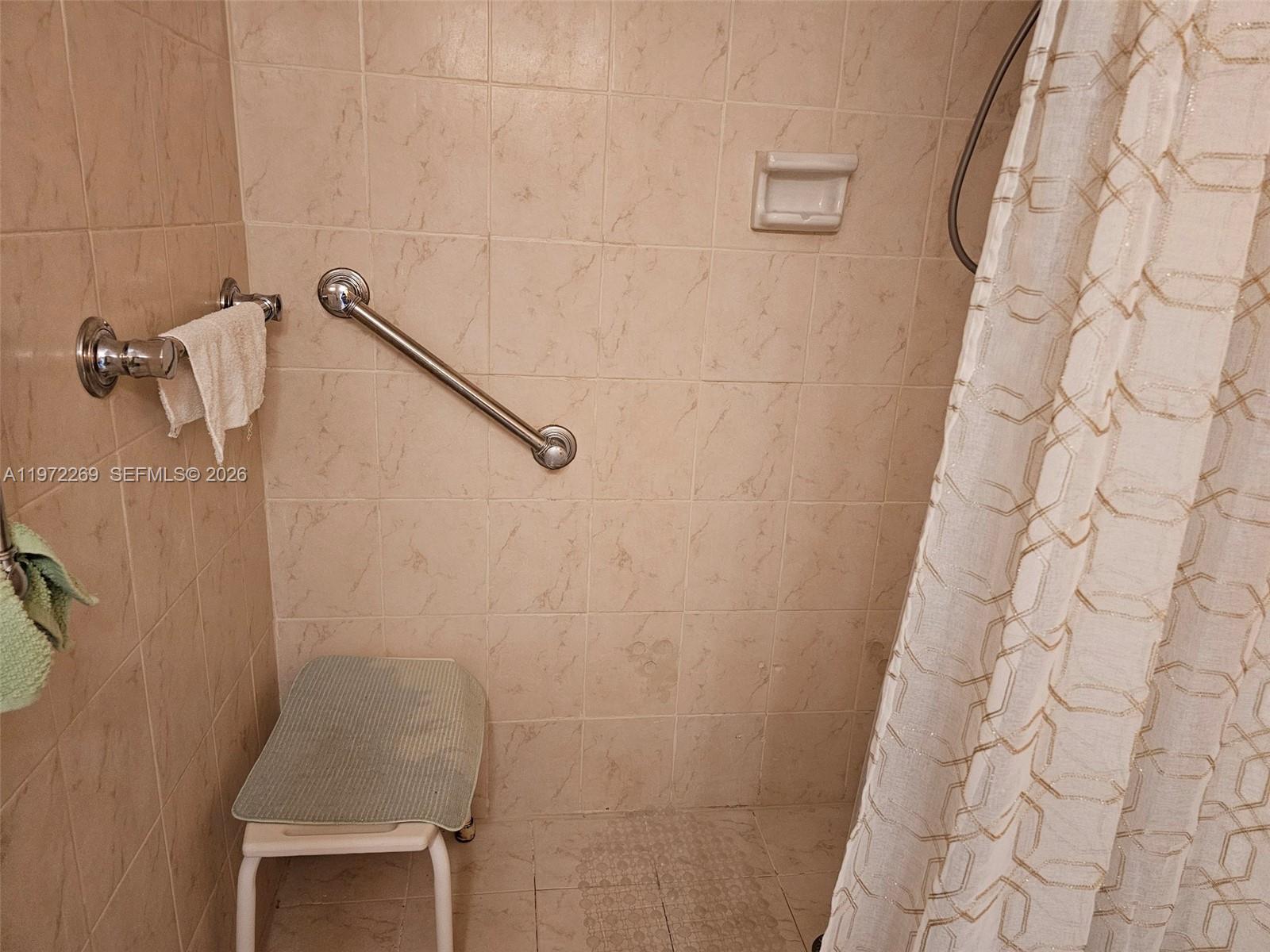 3850 Washington Street, Unit 516 Hollywood, FL 33021 - Photo 17 of 17 a bathroom with a shower