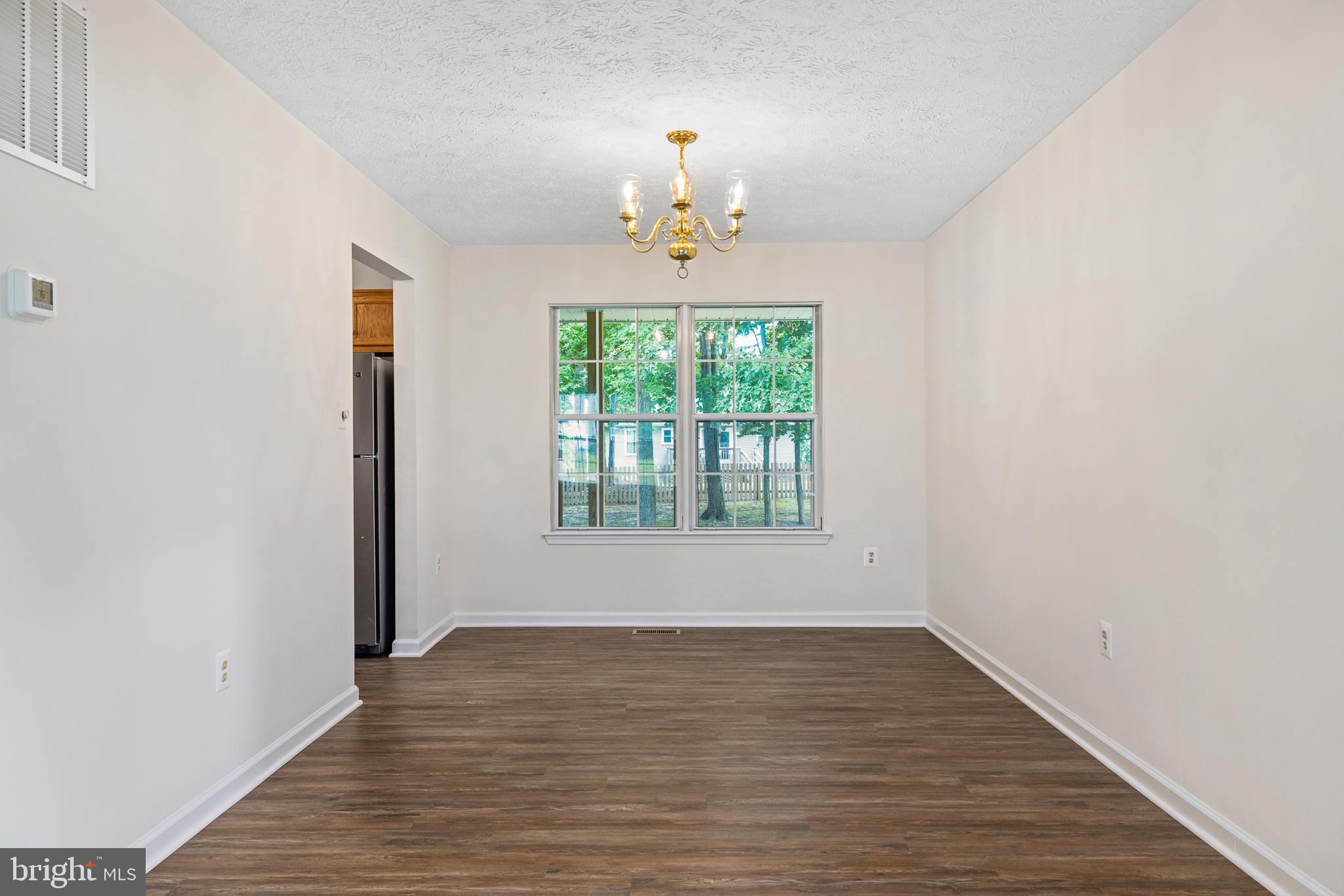 7 Redskin Drive Fredericksburg, VA 22405 - Photo 13 of 39 Dining Room overlooking back yard