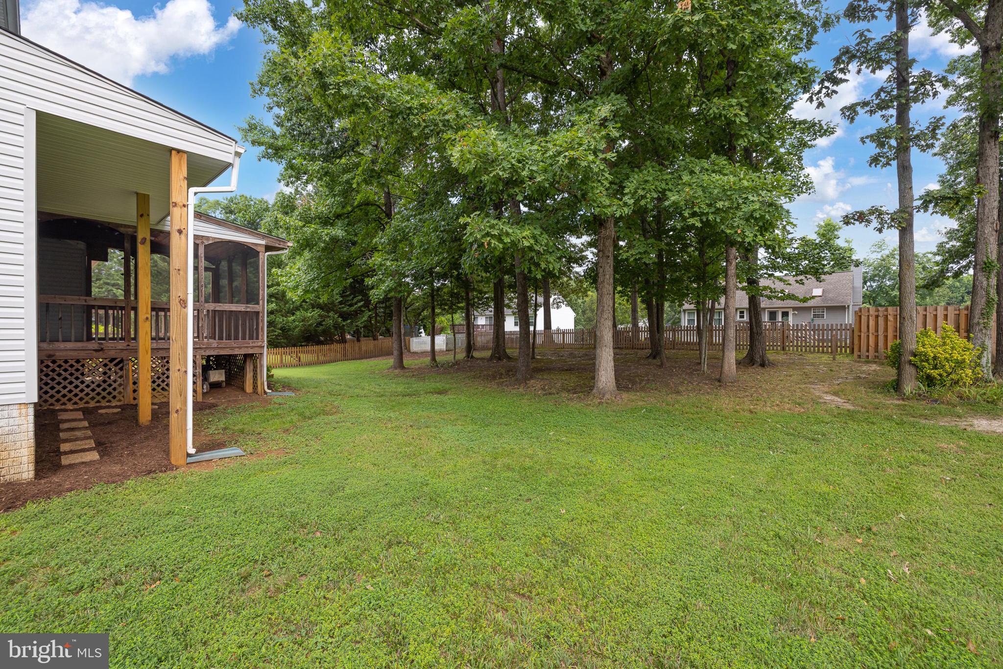 7 Redskin Drive Fredericksburg, VA 22405 - Photo 36 of 39 Trees offer backyard shading for the hot days