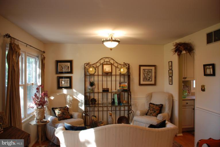 2302 Furnace Road Fallston, MD 21047 - Photo 2 of 23 a living room with furniture a lamp and a window