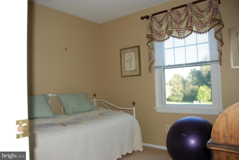 2302 Furnace Road Fallston, MD 21047 - Photo 12 of 23 a bedroom with a bed and a window