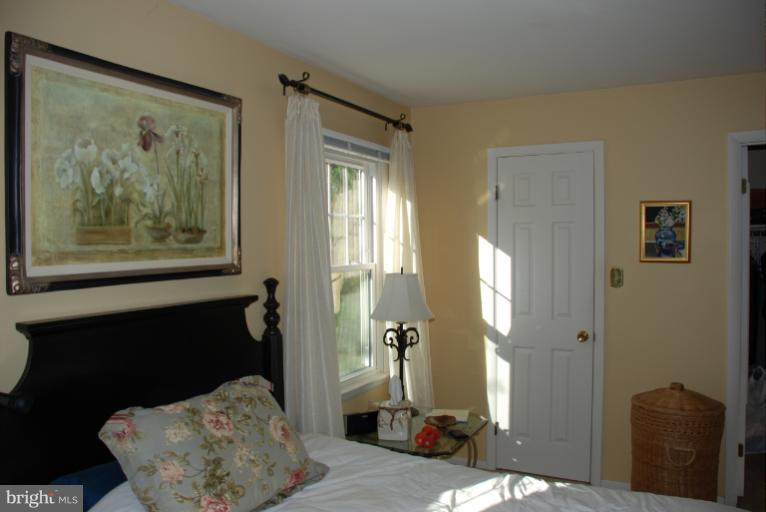 2302 Furnace Road Fallston, MD 21047 - Photo 13 of 23 a bedroom with a bed and a painting on the wall