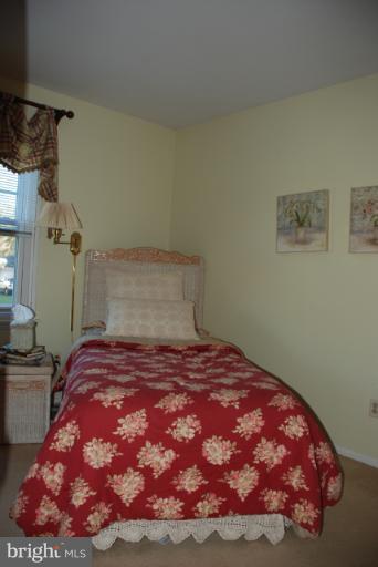 2302 Furnace Road Fallston, MD 21047 - Photo 14 of 23 a bedroom with a bed and a cabinets