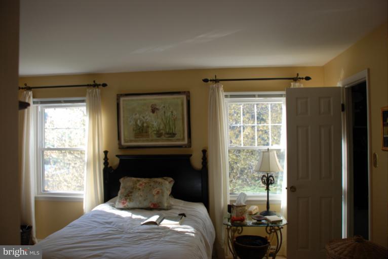 2302 Furnace Road Fallston, MD 21047 - Photo 3 of 23 a bedroom with a bed and a window
