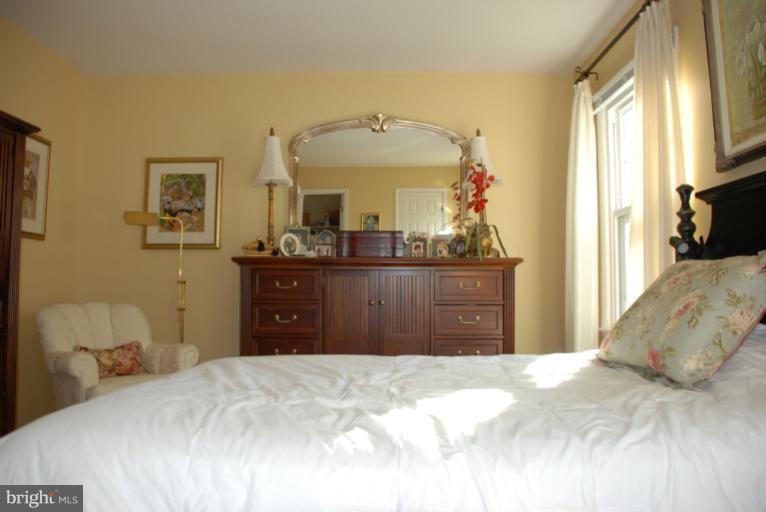 2302 Furnace Road Fallston, MD 21047 - Photo 4 of 23 a bedroom with a bed and a dresser
