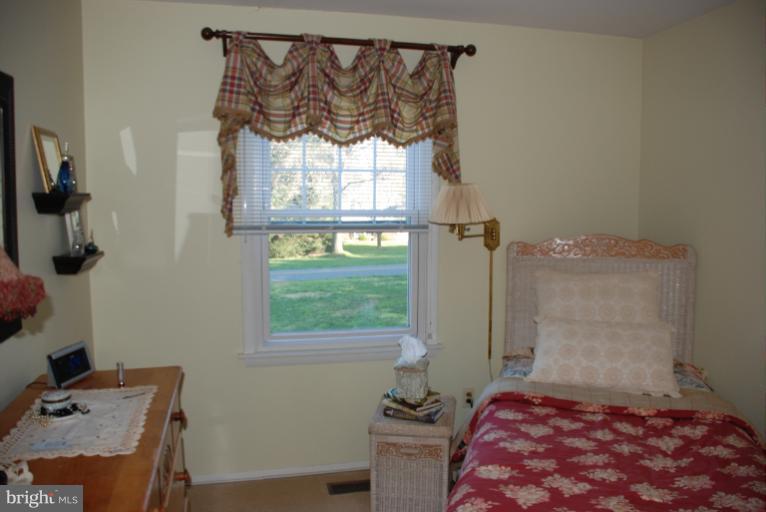 2302 Furnace Road Fallston, MD 21047 - Photo 10 of 23 a bedroom with a bed and a window
