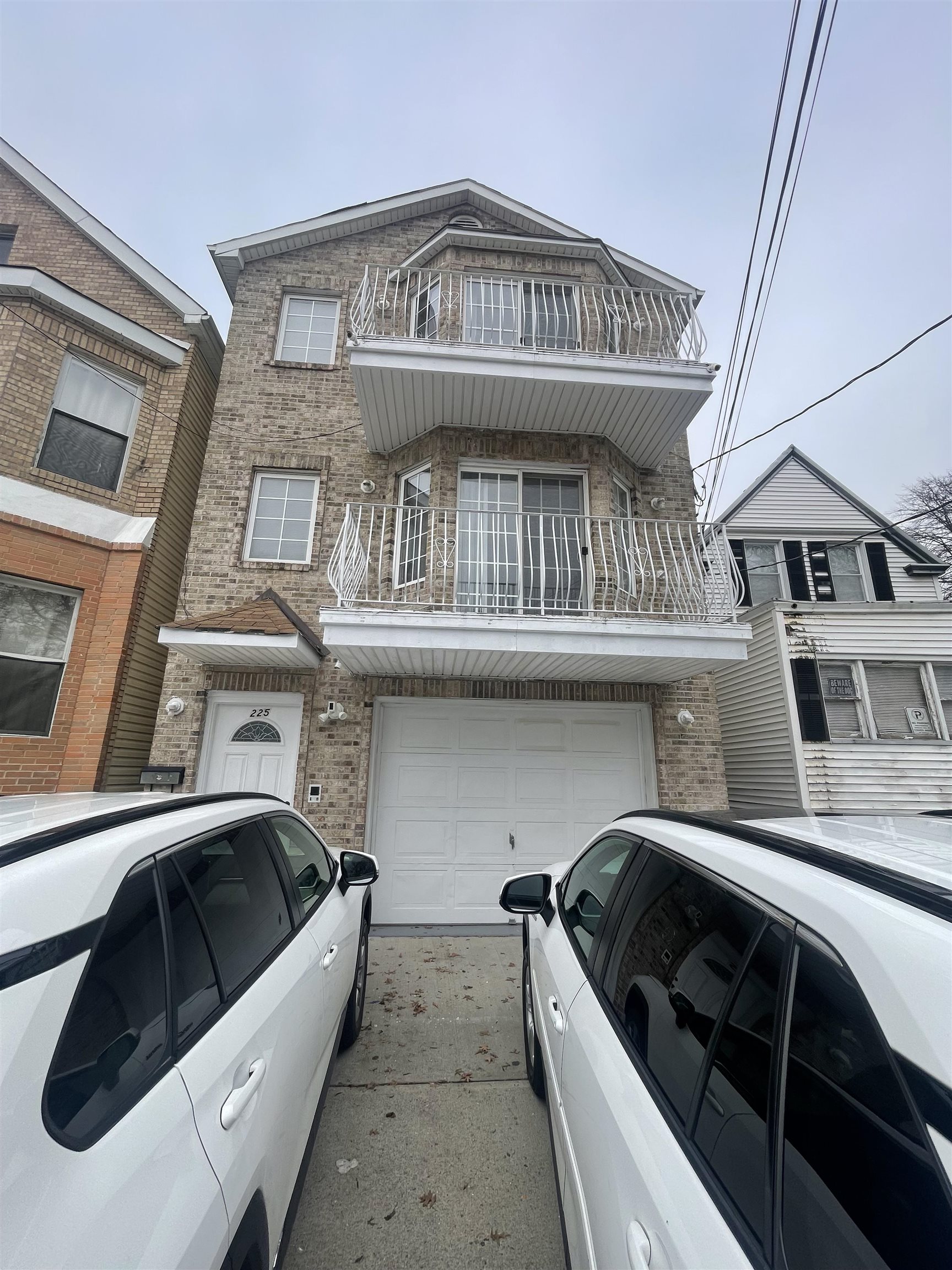 225 Belvidere Avenue, Unit 2 Jersey City, NJ 07306 - Photo 18 of 18 a view of a car park in front of a building