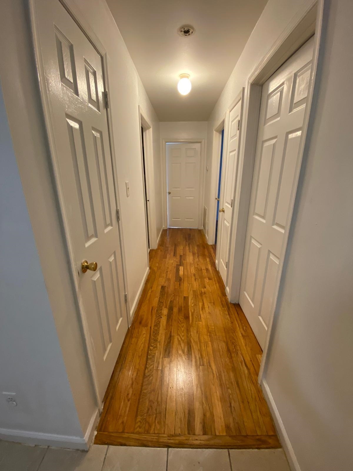 225 Belvidere Avenue, Unit 2 Jersey City, NJ 07306 - Photo 4 of 18 a view of a hallway