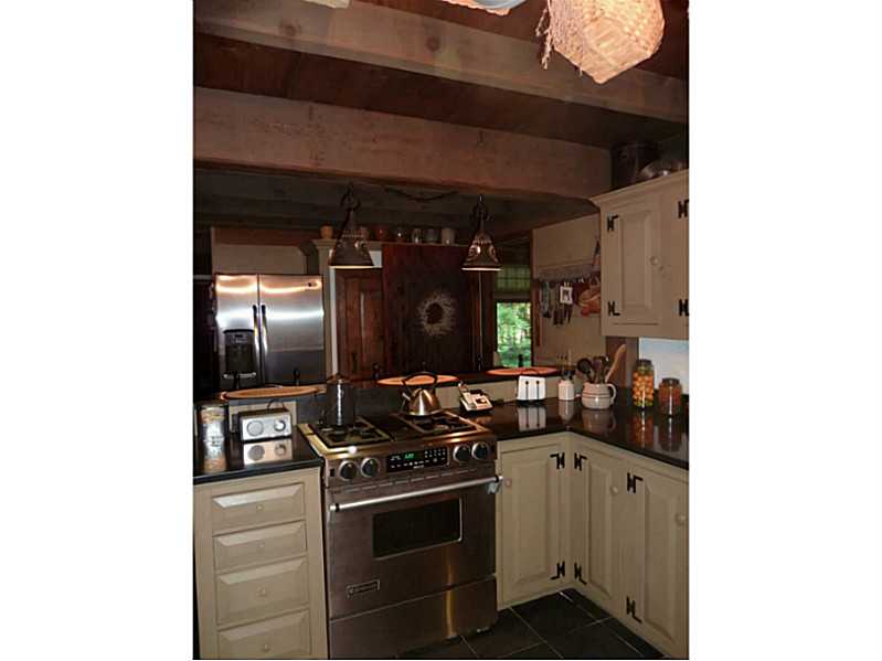 120 Jackson Schoolhouse Road Glocester, RI 02814 - Photo 11 of 21 Kitchen. Custom Shaker Cabinets...Slate floor..Jenn Air Range