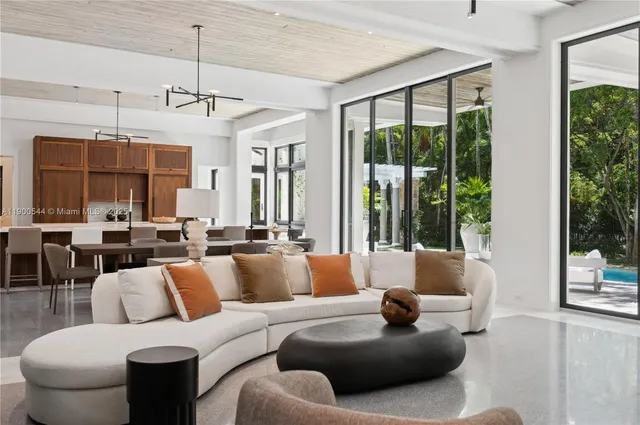 a kitchen with stainless steel appliances granite countertop a sink and a stove