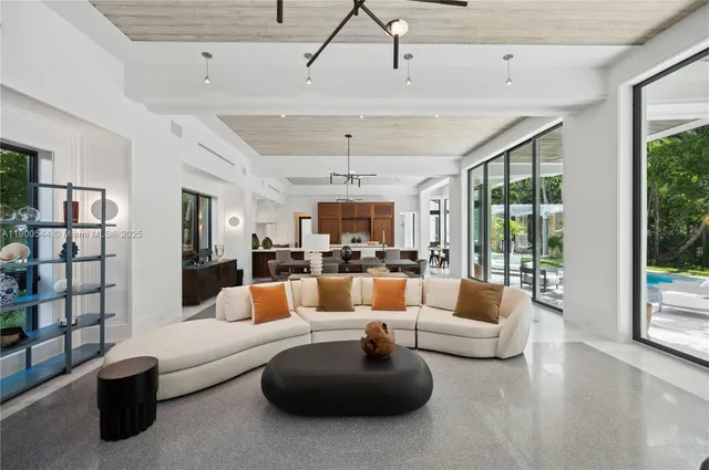 a bed room with a bed and a painting on the wall