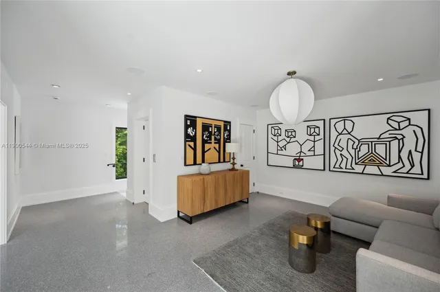 a bathroom with a sink a bathtub and window