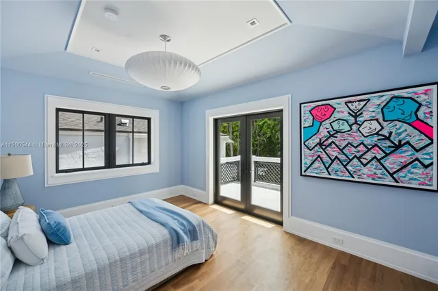 a front view of a house with a yard and a garage