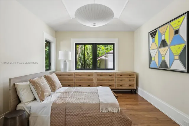 a black and white photo of a refrigerator
