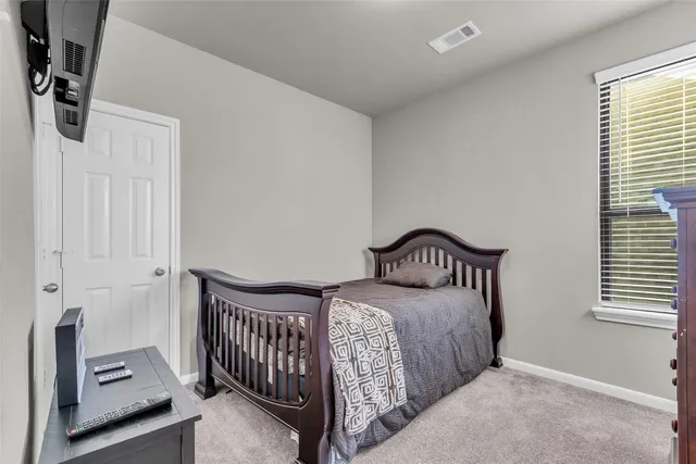 a bathroom with a double vanity sink and a bathtub