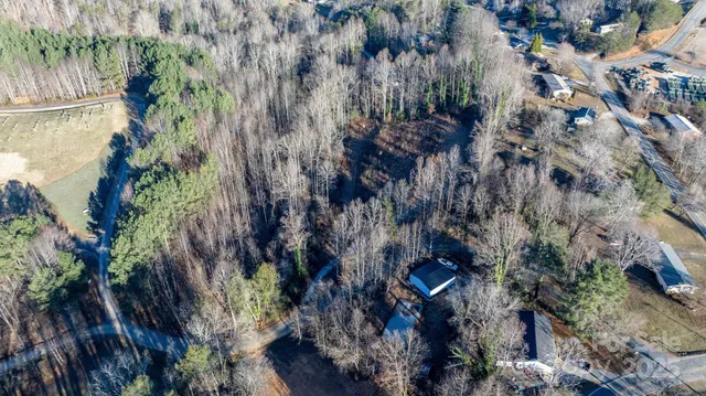 a view of a and mountain in a field