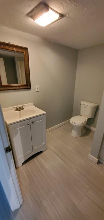 211 New Boston Road Sturbridge, MA 01566 - Photo 19 of 23 a bathroom with a sink a toilet and mirror