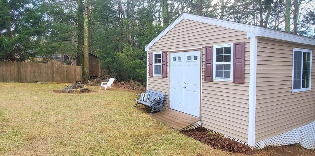 211 New Boston Road Sturbridge, MA 01566 - Photo 20 of 23 a view of a house with a yard
