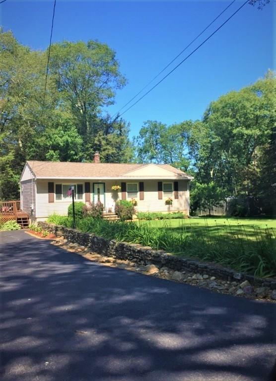 211 New Boston Road Sturbridge, MA 01566 - Photo 3 of 23 a front view of house with yard and green space