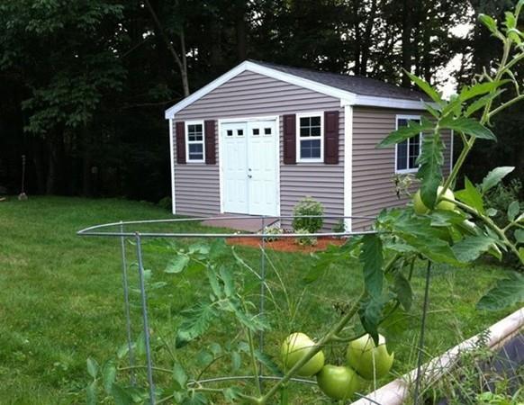 211 New Boston Road Sturbridge, MA 01566 - Photo 7 of 23 a front view of house with yard and green space