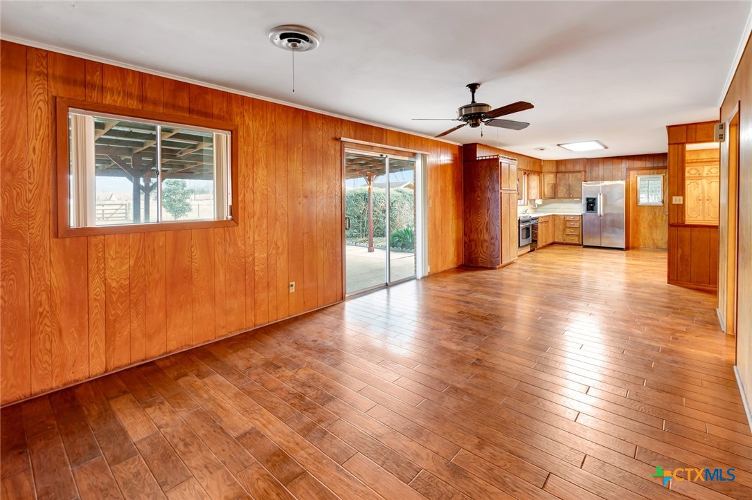 711 Northgate Road Victoria, TX 77904 - Photo 15 of 37 a view of an empty room with window and wooden floor