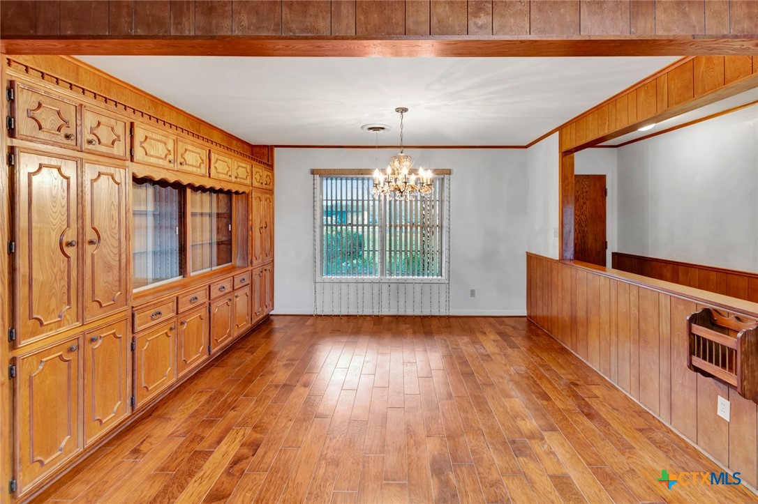 711 Northgate Road Victoria, TX 77904 - Photo 5 of 37 a view of an entryway with wooden floor