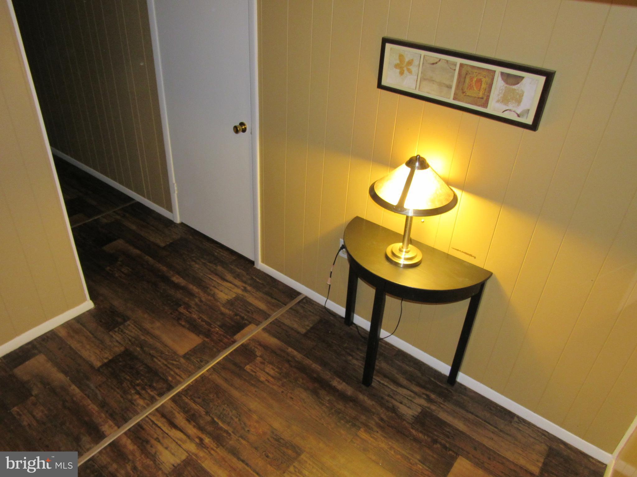 8710 Windsor Mill Road Baltimore, MD 21244 - Photo 21 of 30 a view of entryway with wooden floor
