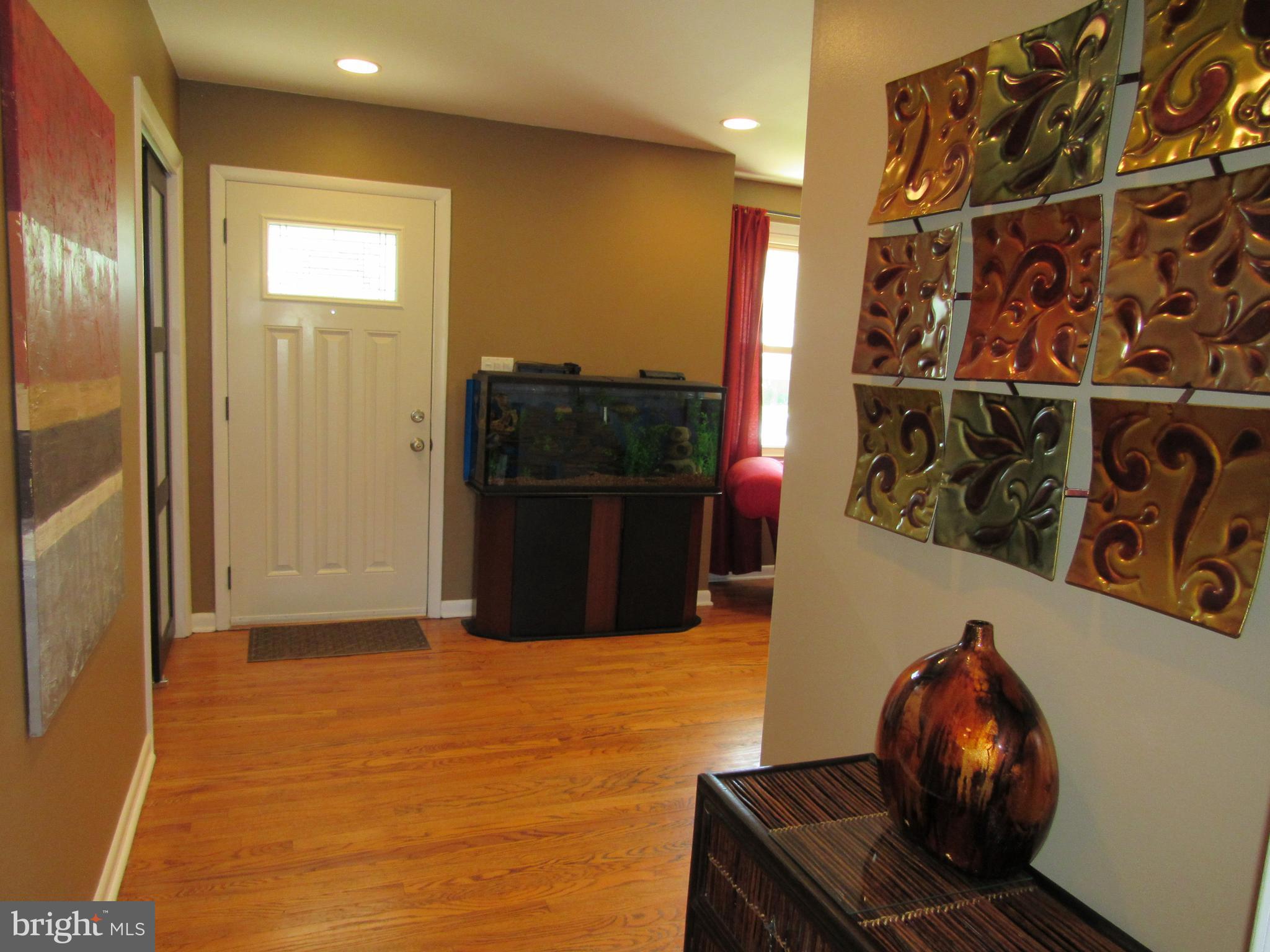 8710 Windsor Mill Road Baltimore, MD 21244 - Photo 7 of 30 a view of entryway with wooden floor
