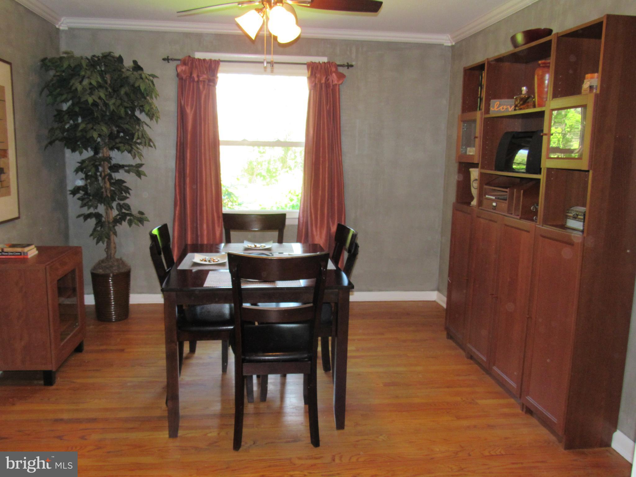 8710 Windsor Mill Road Baltimore, MD 21244 - Photo 8 of 30 a dining room with furniture and window