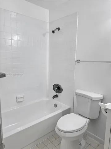 an empty room with a bench