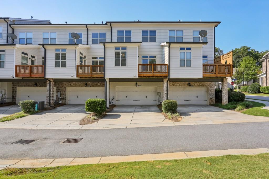 3899 Glenview Club Lane Duluth, GA 30097 - Photo 36 of 38 a view of a street with houses