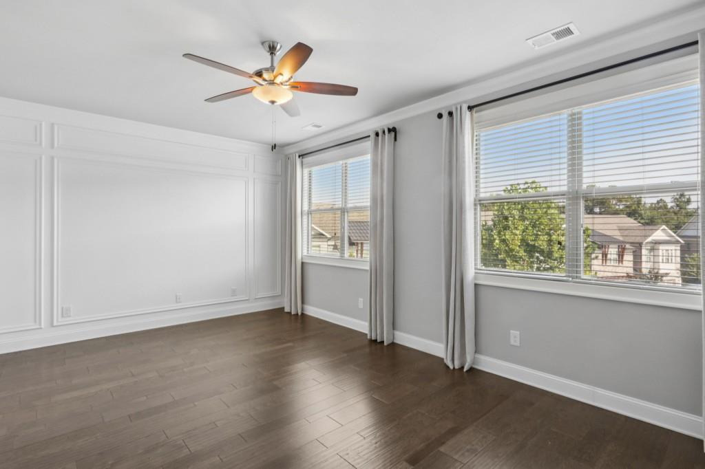 3899 Glenview Club Lane Duluth, GA 30097 - Photo 4 of 38 a view of an empty room with a window