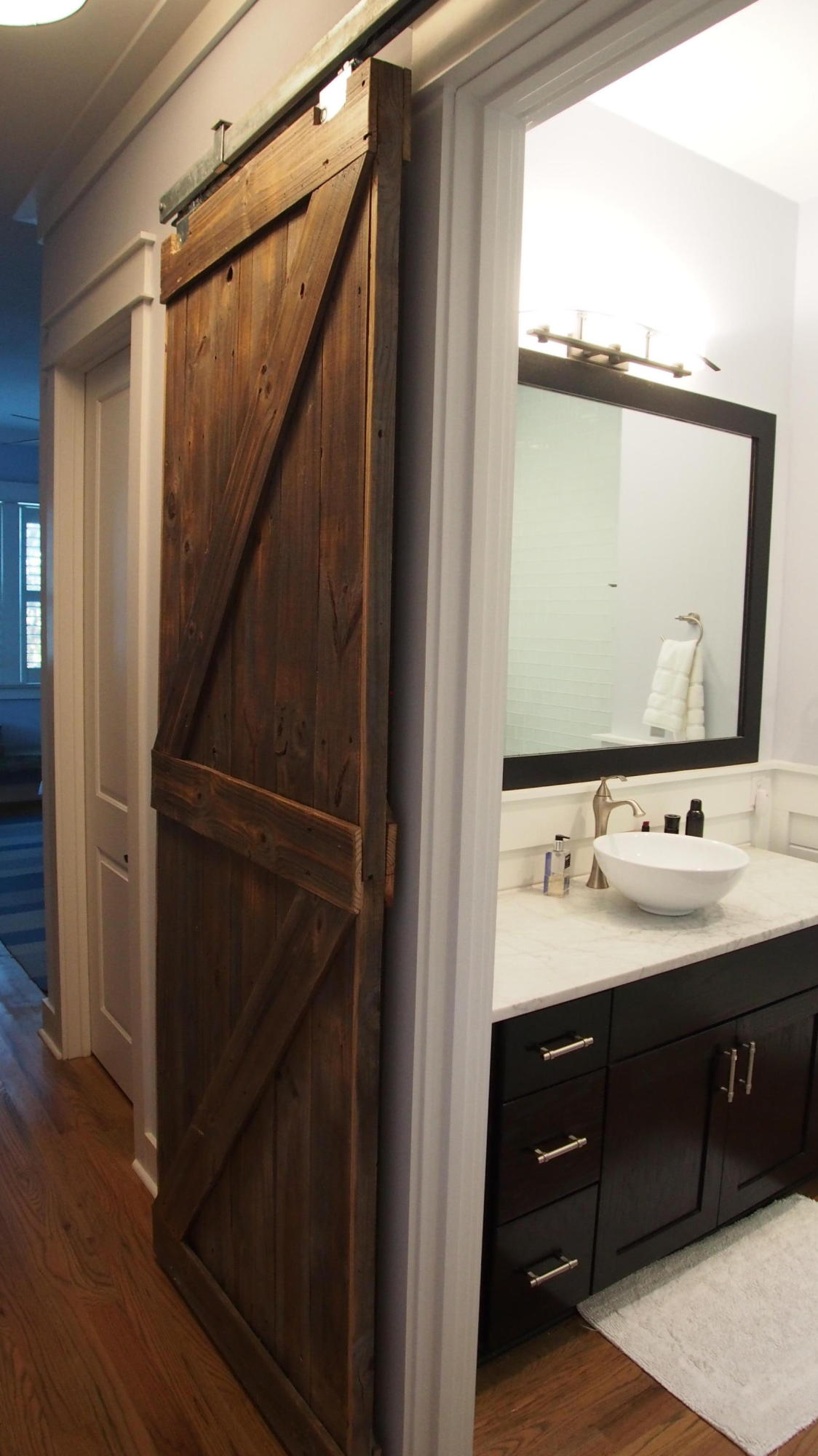 19 Dune Ridge Road Santa Rosa Beach, FL 32459 - Photo 13 of 29 a bathroom with a double vanity sink and mirror
