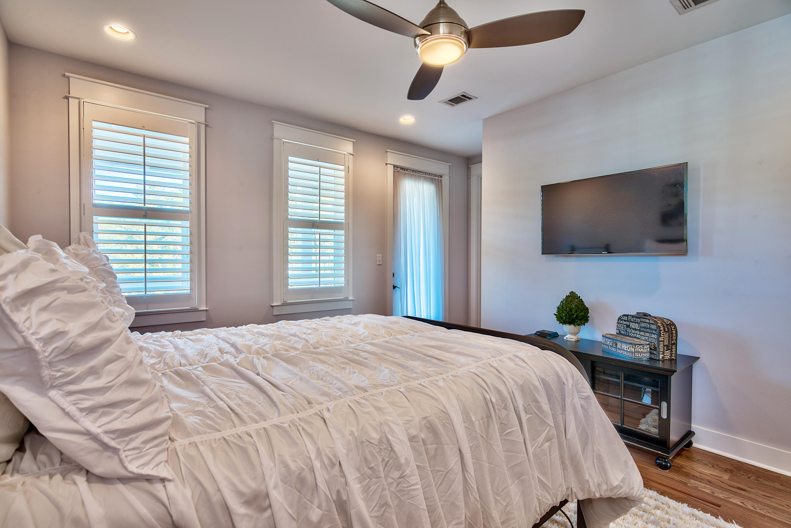 19 Dune Ridge Road Santa Rosa Beach, FL 32459 - Photo 16 of 29 a bedroom with a bed and a flat screen tv