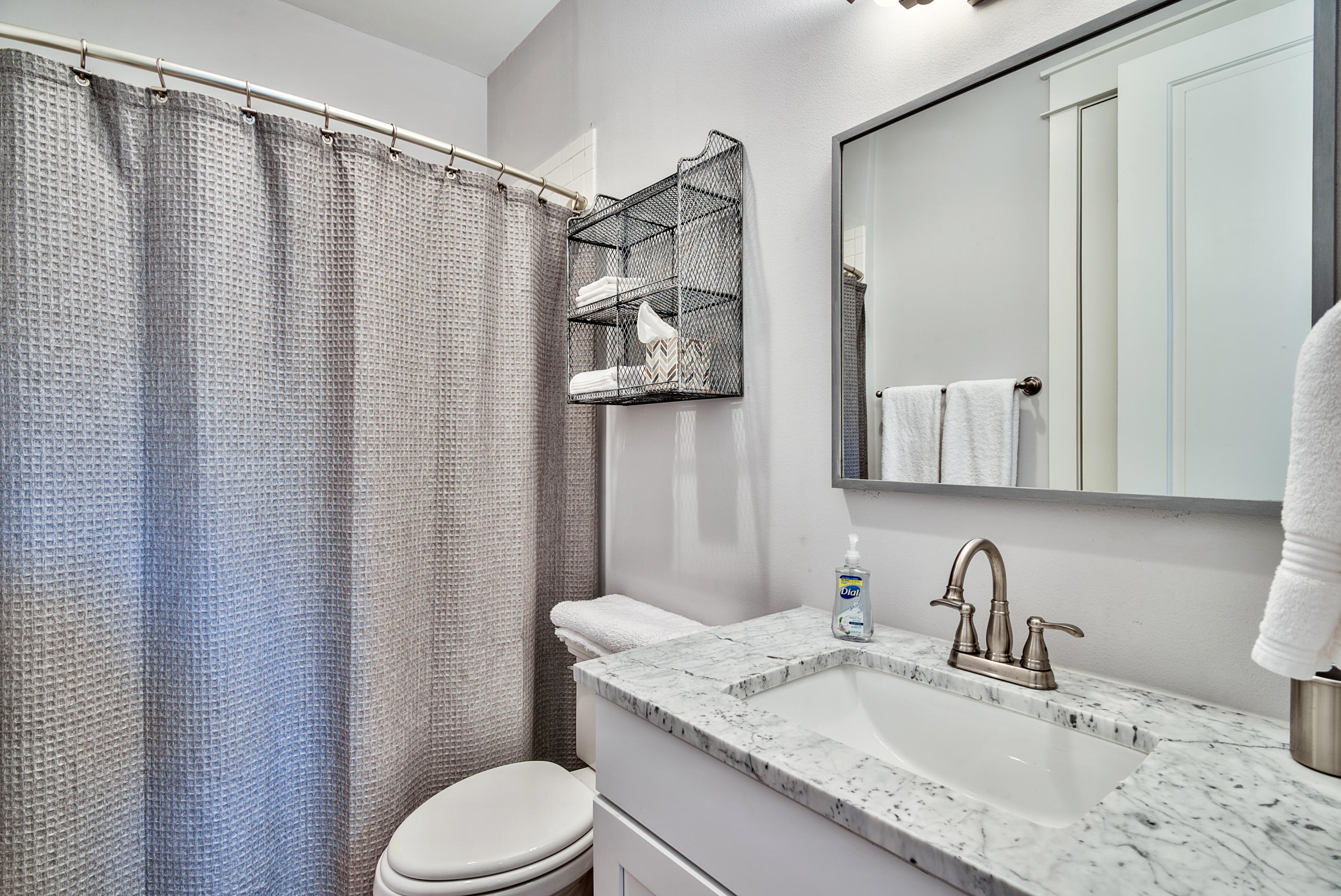 19 Dune Ridge Road Santa Rosa Beach, FL 32459 - Photo 22 of 29 a bathroom with a granite countertop sink toilet and shower