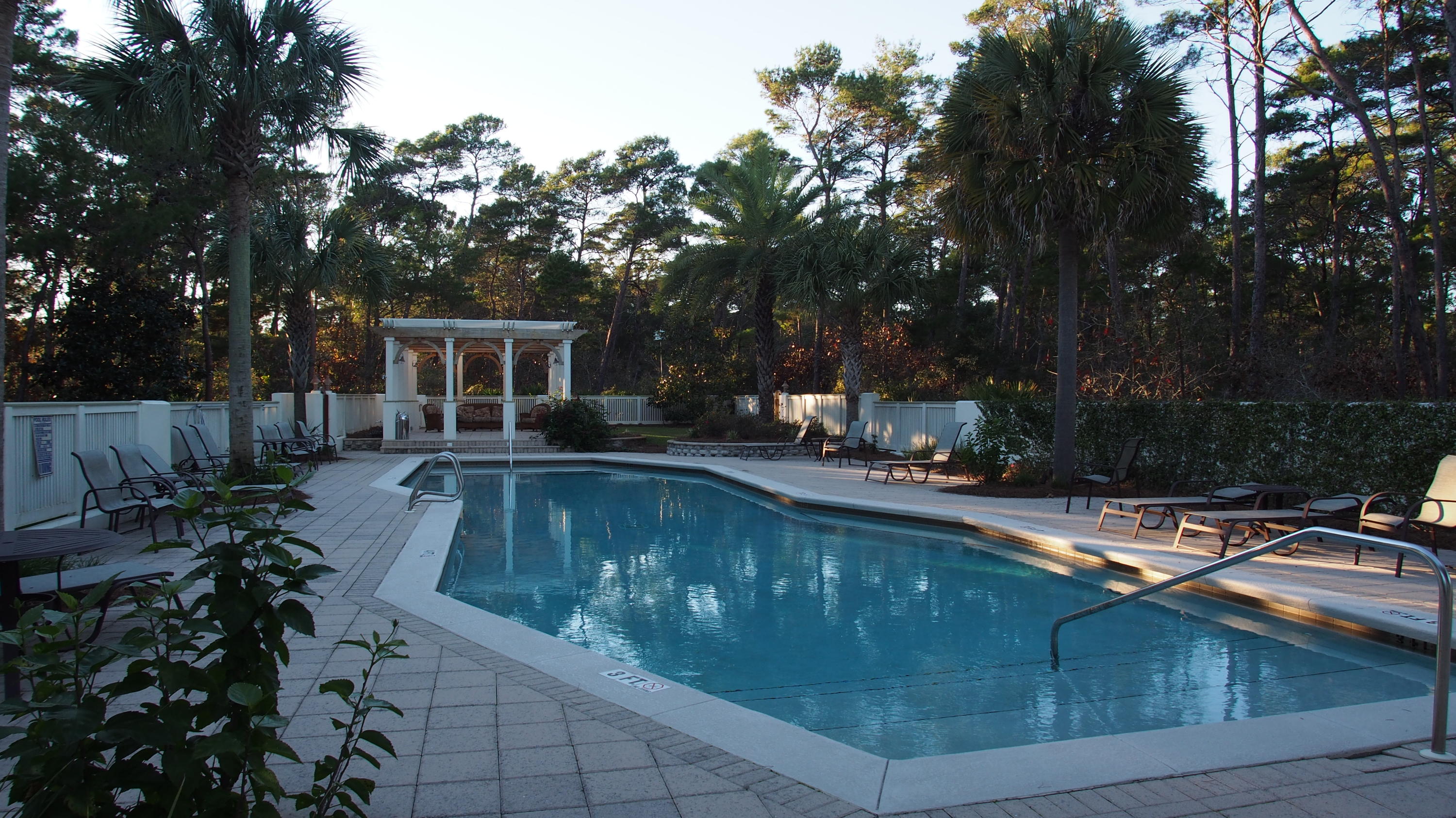 19 Dune Ridge Road Santa Rosa Beach, FL 32459 - Photo 27 of 29 a swimming pool view with a seating space