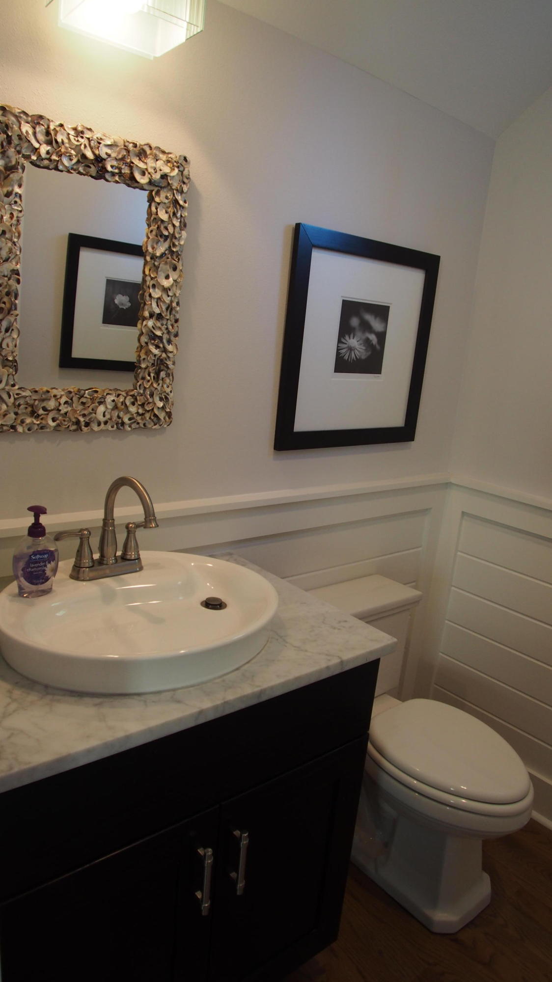 19 Dune Ridge Road Santa Rosa Beach, FL 32459 - Photo 9 of 29 a bathroom with a toilet a sink and mirror