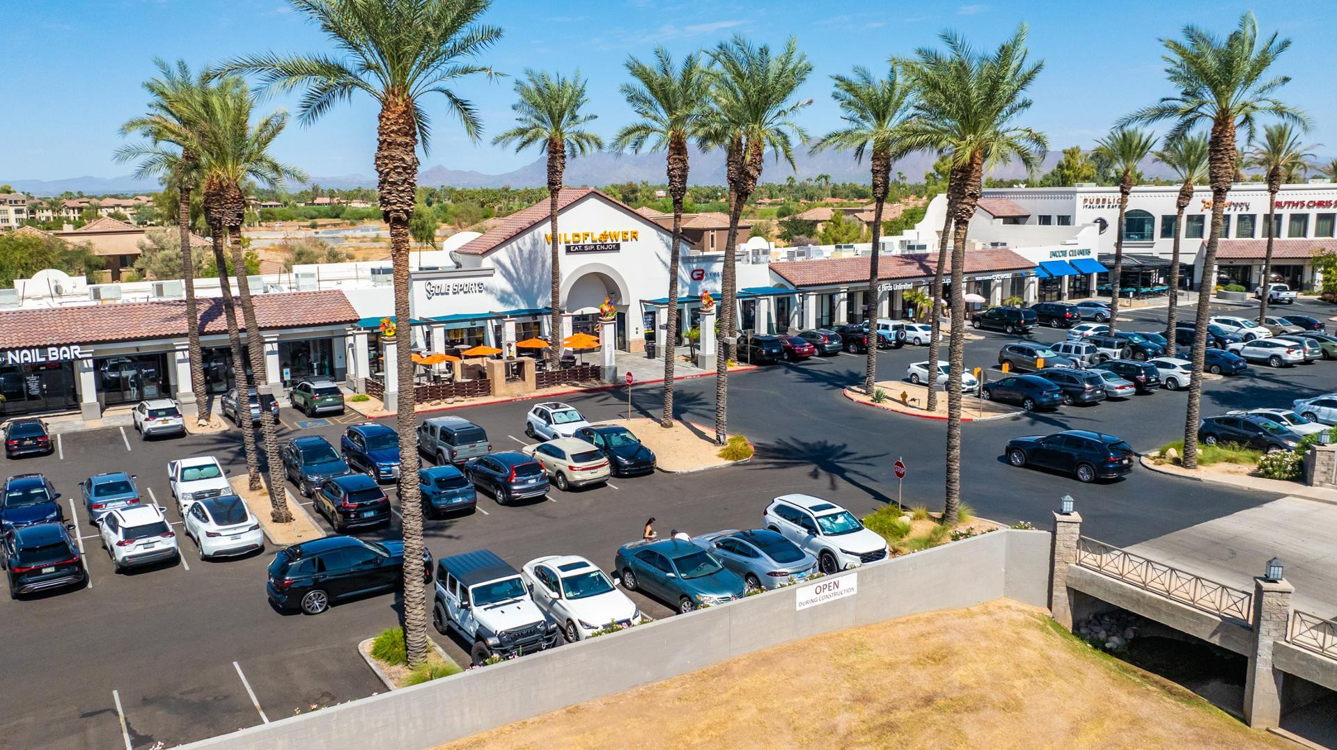 7027 North Scottsdale Road, Unit 225 Scottsdale, AZ 85253 - Photo 44 of 48 a view of a swimming pool with outdoor seating