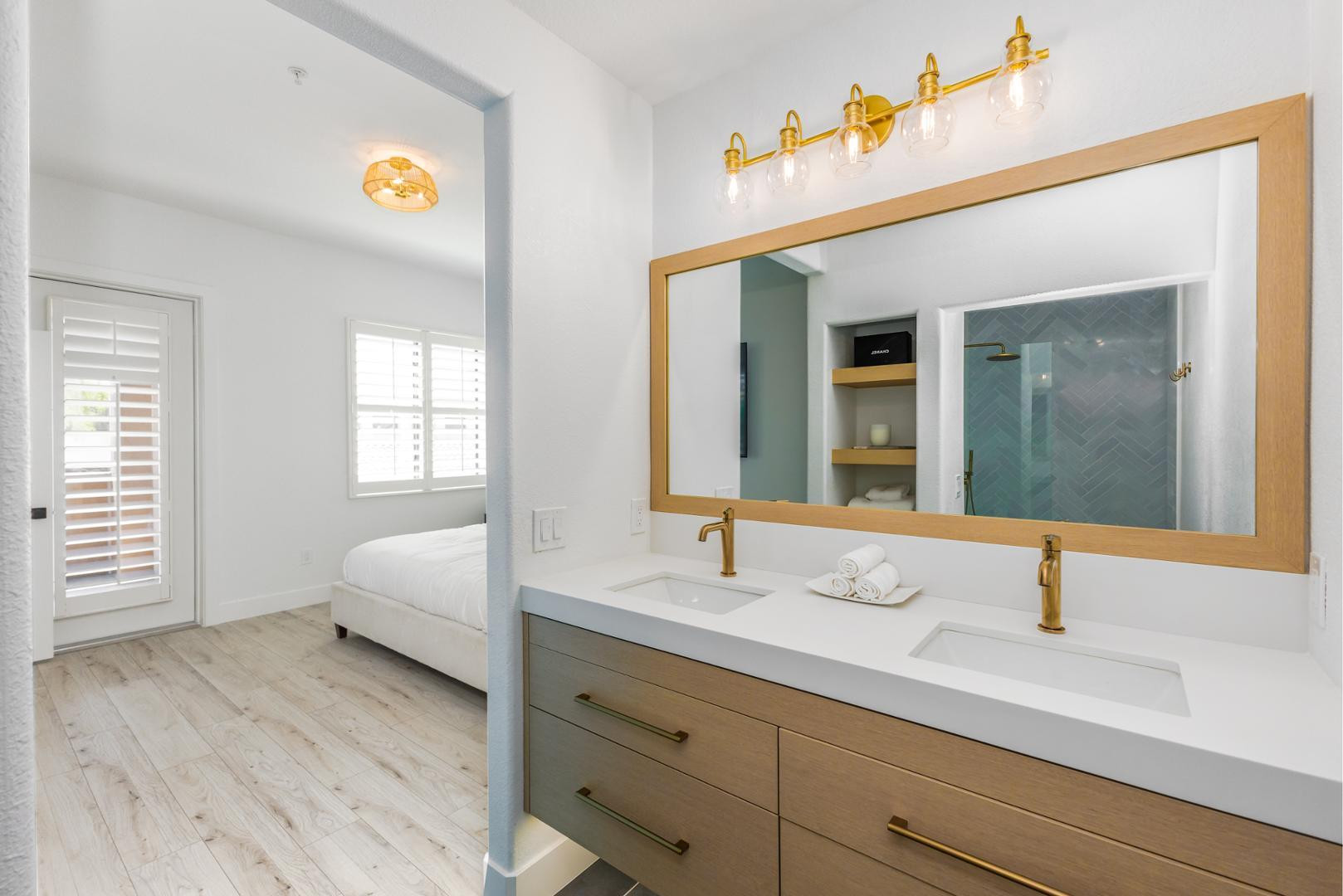 7027 North Scottsdale Road, Unit 225 Scottsdale, AZ 85253 - Photo 6 of 48 a en suite bathroom with a sink and a large mirror