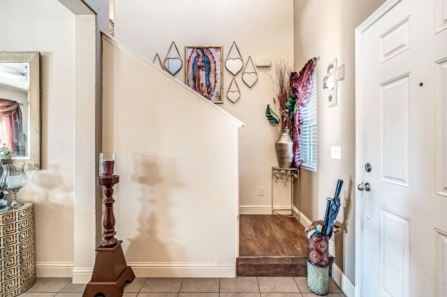 877 Sandra Avenue Sanger, CA 93657 - Photo 18 of 40 a view of a hallway with wooden walls and stairs