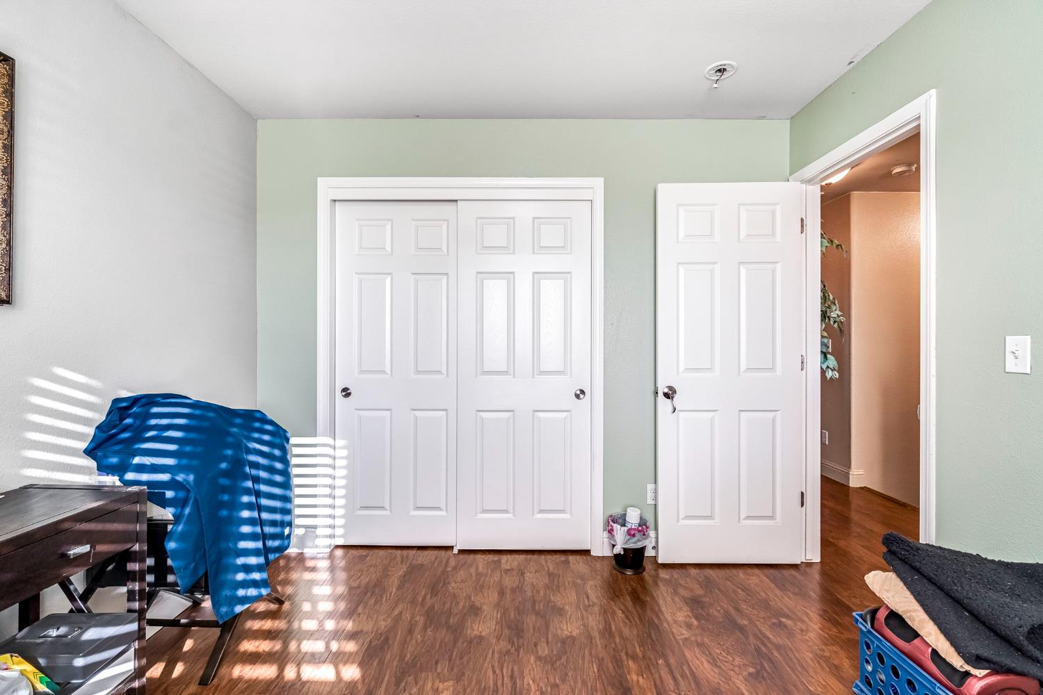 877 Sandra Avenue Sanger, CA 93657 - Photo 27 of 40 a view of livingroom with hardwood floor and hallway