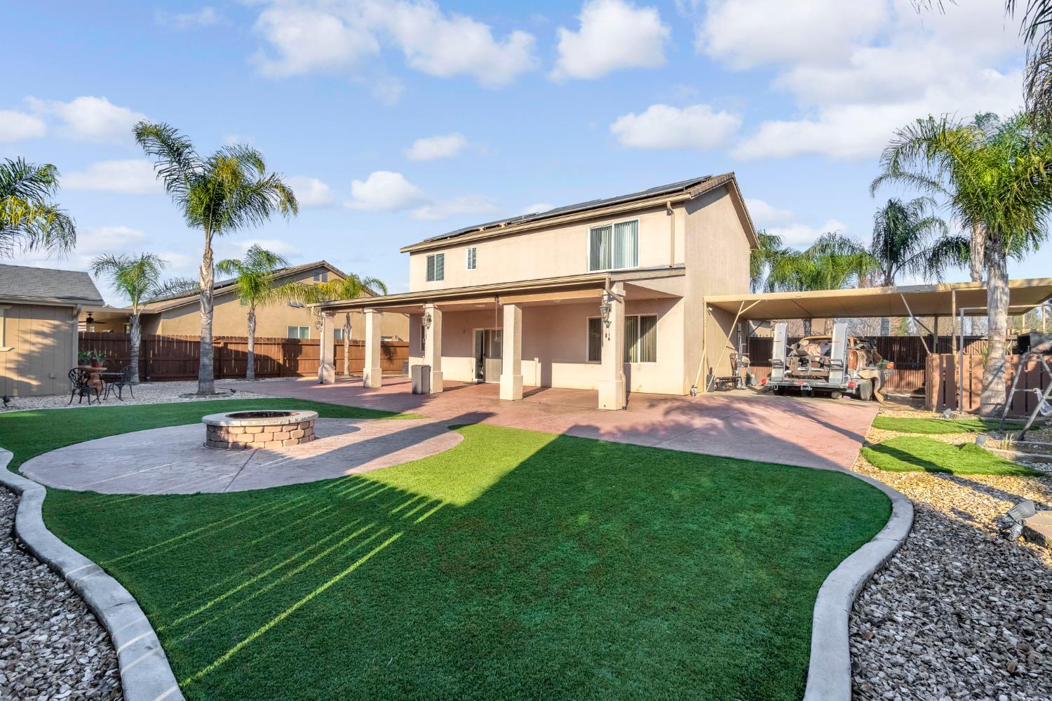 877 Sandra Avenue Sanger, CA 93657 - Photo 38 of 40 a view of a house with swimming pool and porch